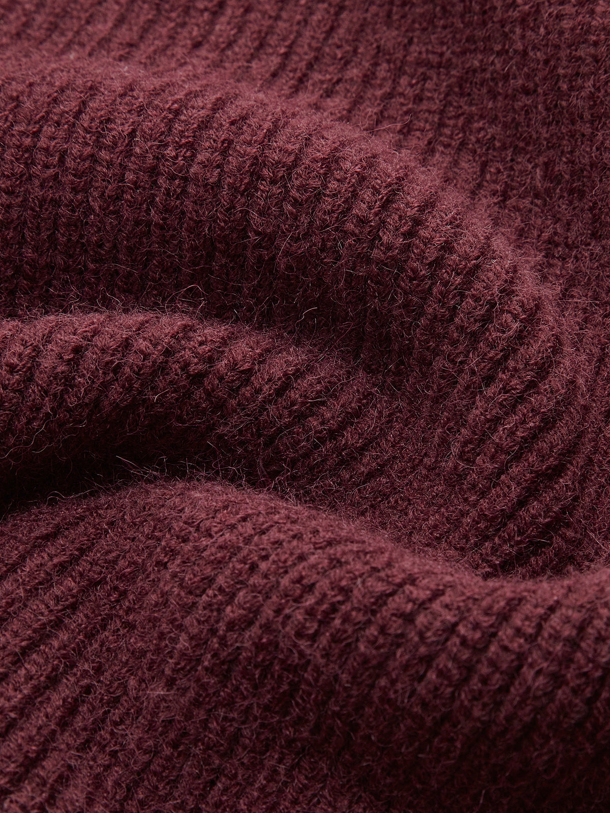 Oversized sweater with a high collar