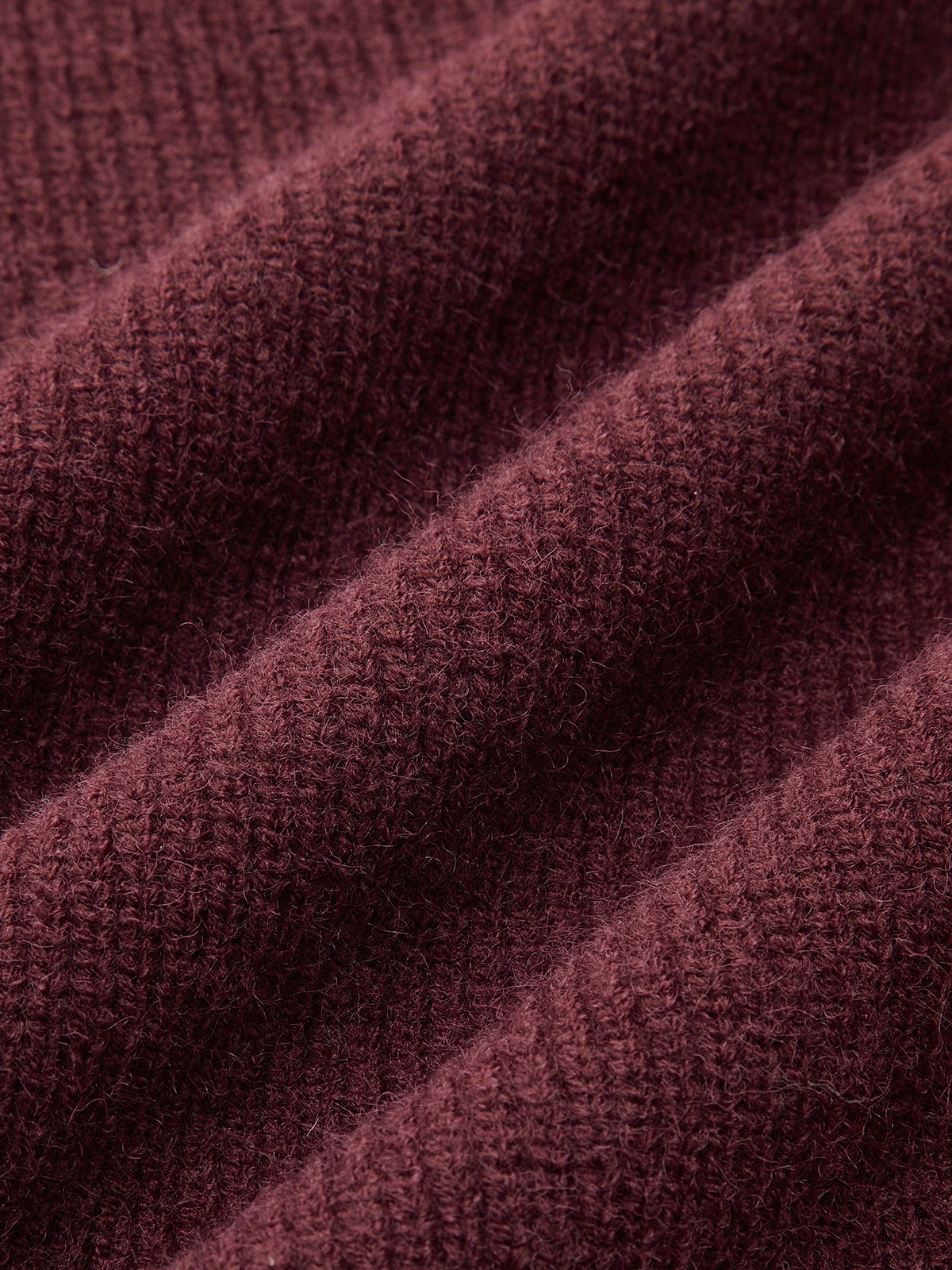 Oversized sweater with a high collar