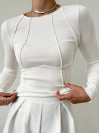 Basisk långärmad topp med passpoal