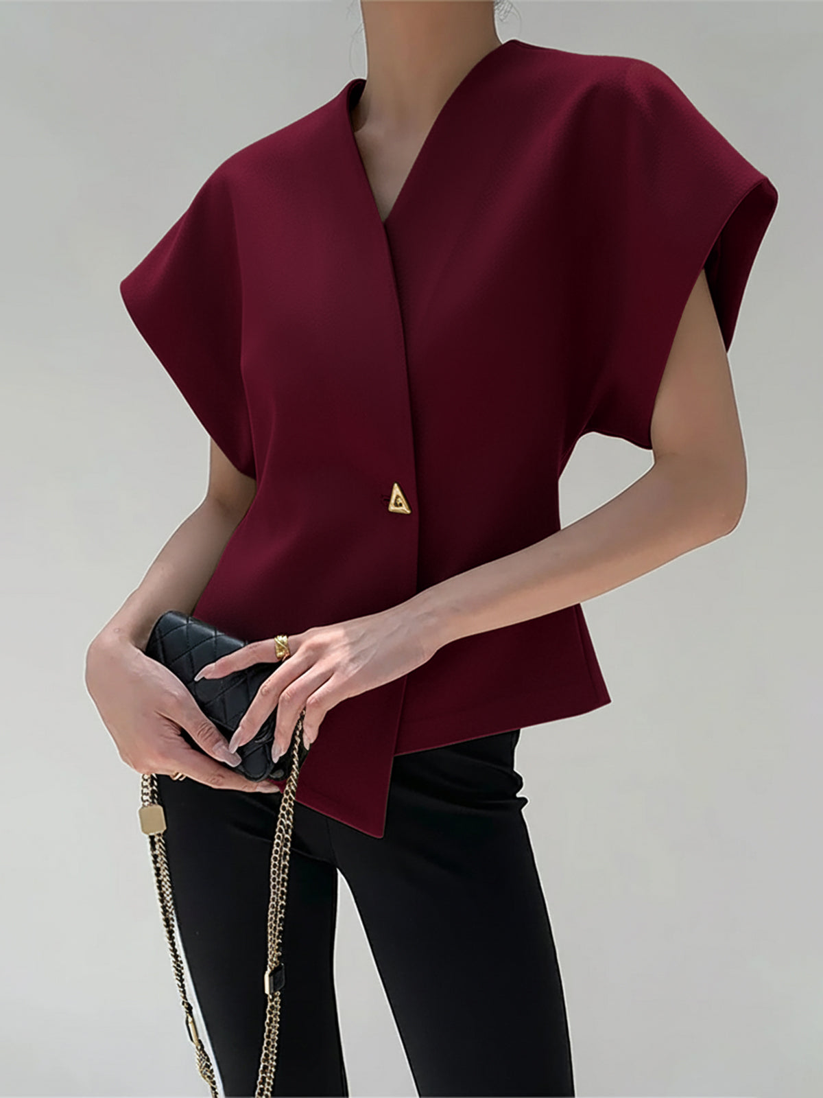 Blus med knäppning framtill