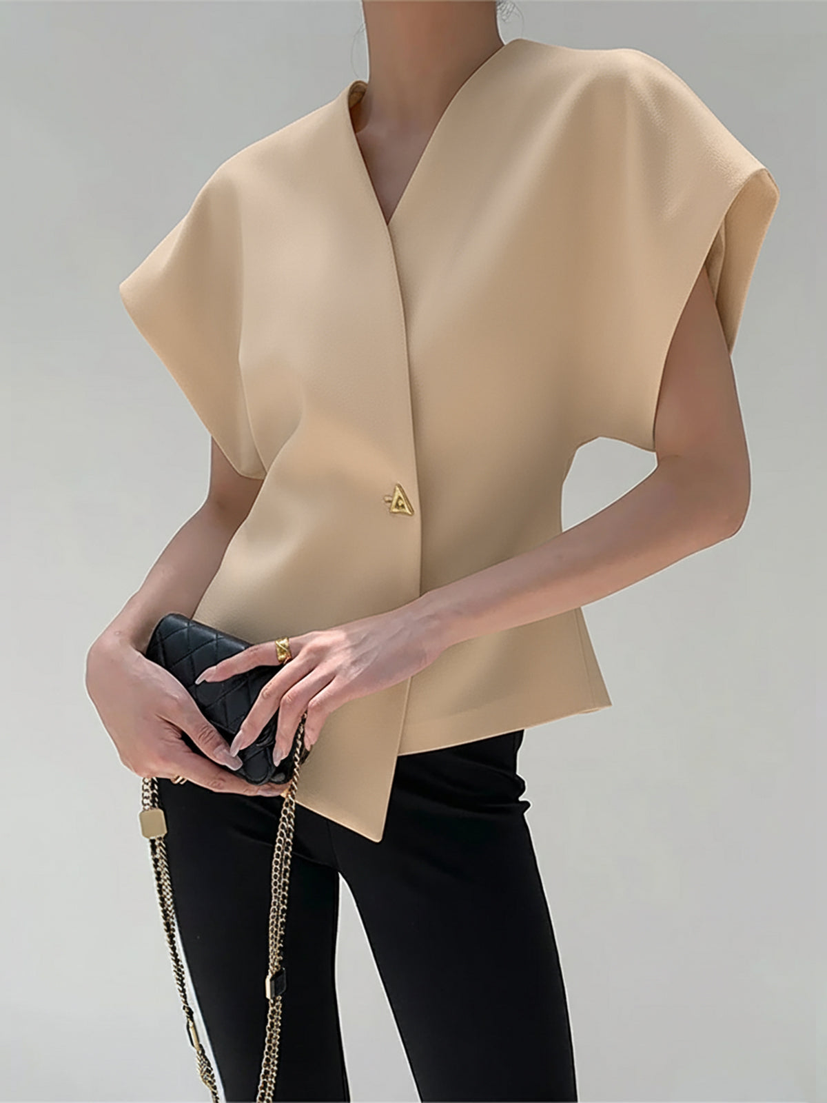 Blus med knäppning framtill